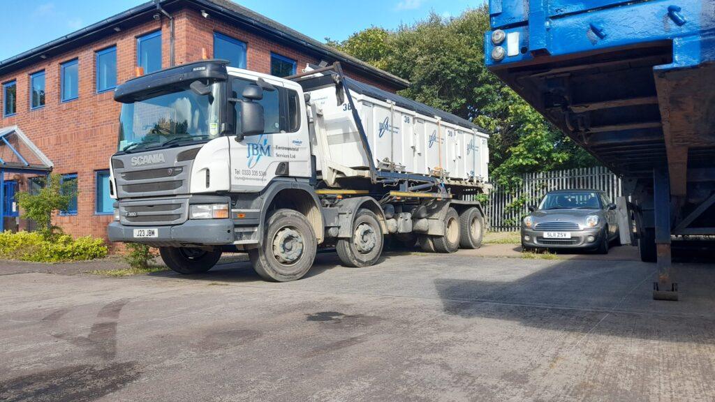 Front end loader bins in transport