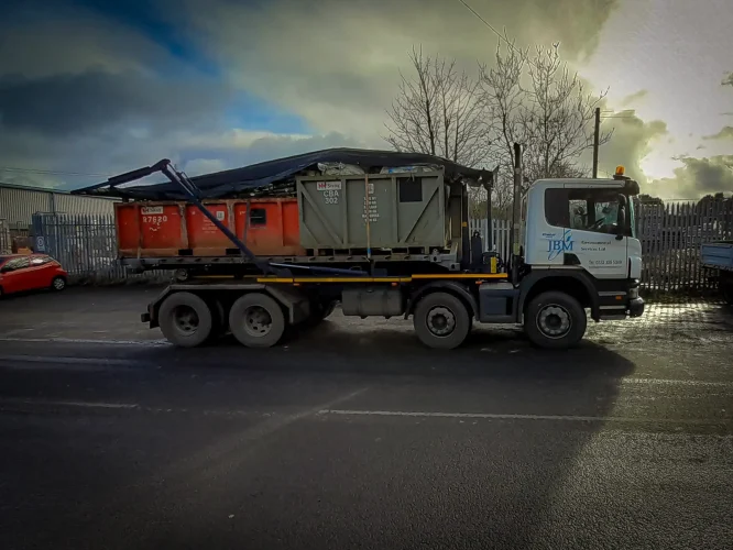 Large off shore waste skips in transport to port