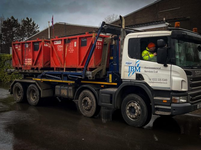 Off shore waste skips in transport to port